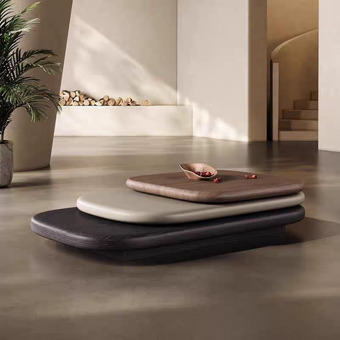 Rotating irregular-shaped coffee table