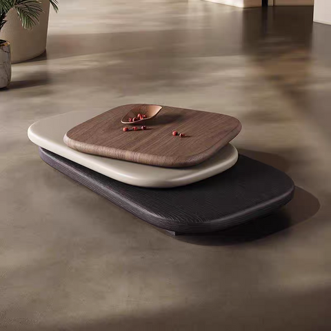 Rotating irregular-shaped coffee table