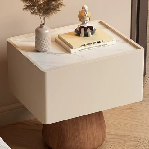 French-style granite bedside cabinet for a minimalist, modern and luxurious bedroom, providing storage space at the bedside.