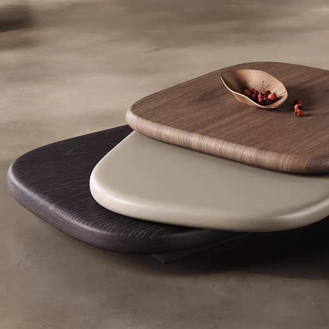 Rotating irregular-shaped coffee table